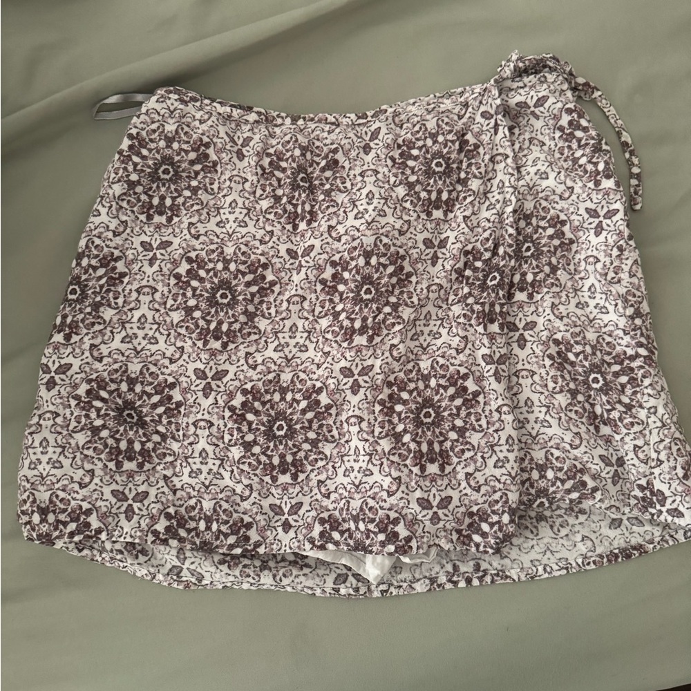 Purple and white wrap around skort